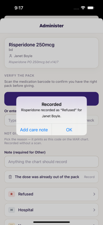 The administer screen with a barcode scan prompt and reason codes, confirming a dose was recorded.